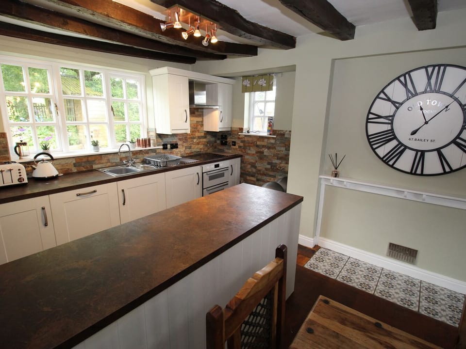 Cottage | Private kitchen | Stovetop, dishwasher, highchair, cookware/dishes/utensils