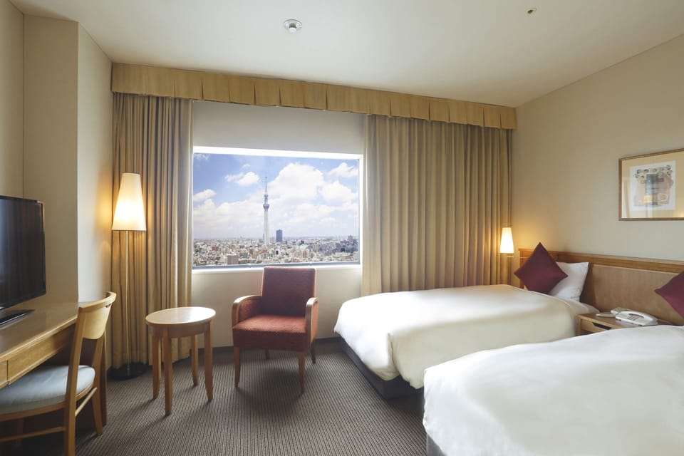 Premium bedding, pillowtop beds, desk, blackout drapes