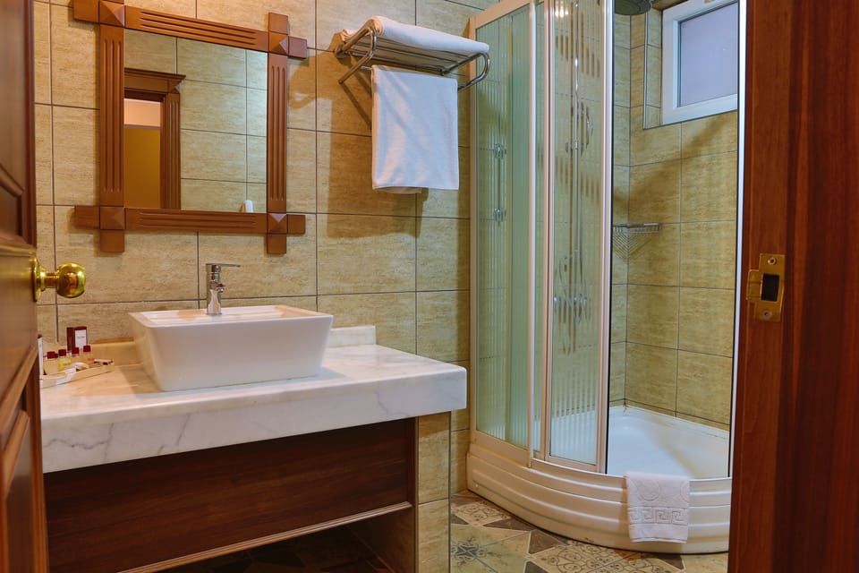Rainfall showerhead, free toiletries, hair dryer, bathrobes