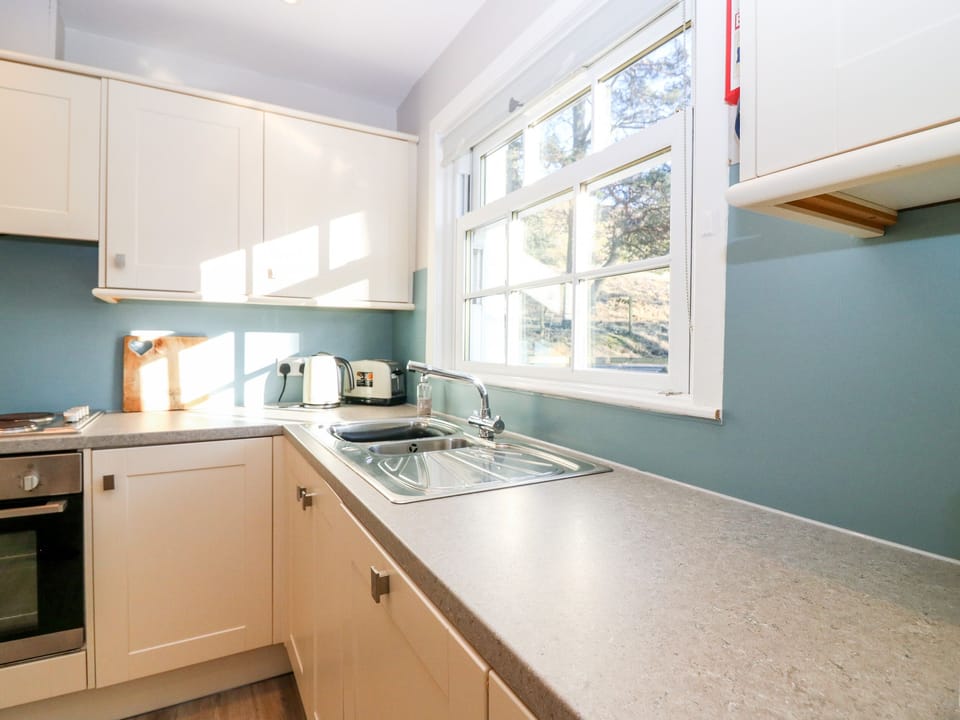 Cottage | Private kitchen | Stovetop, dishwasher, highchair, cookware/dishes/utensils