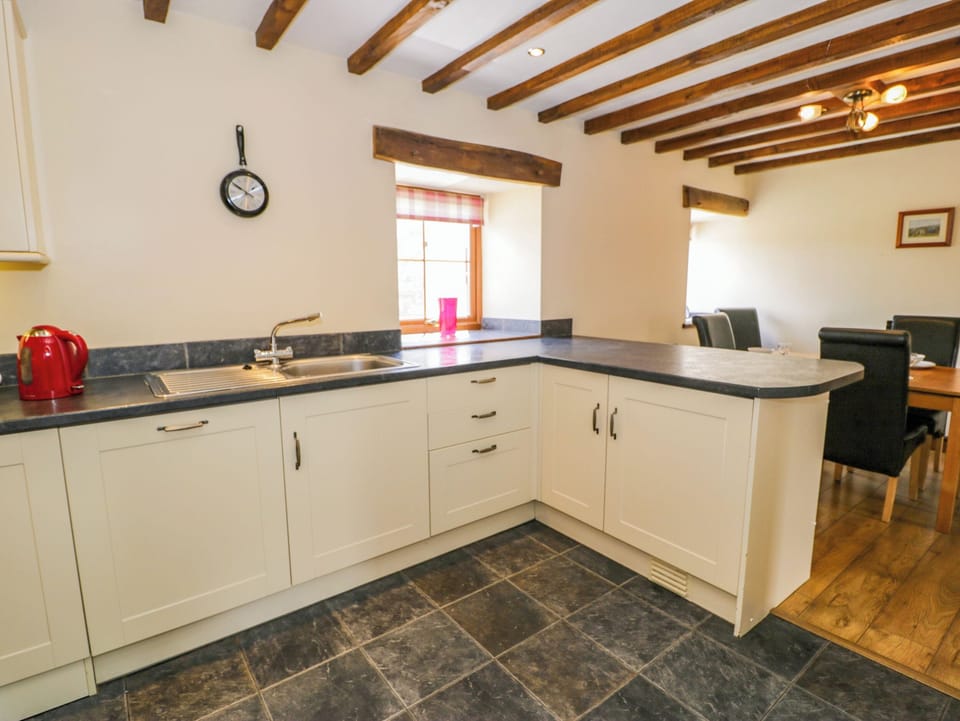 Cottage | Private kitchen | Stovetop, dishwasher, highchair, cookware/dishes/utensils