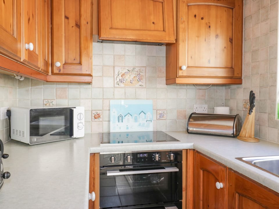 Cottage | Private kitchen | Highchair, cookware/dishes/utensils