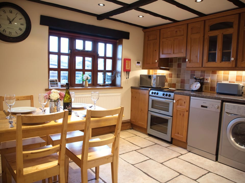 Cottage | Private kitchen | Stovetop, dishwasher, highchair, cookware/dishes/utensils