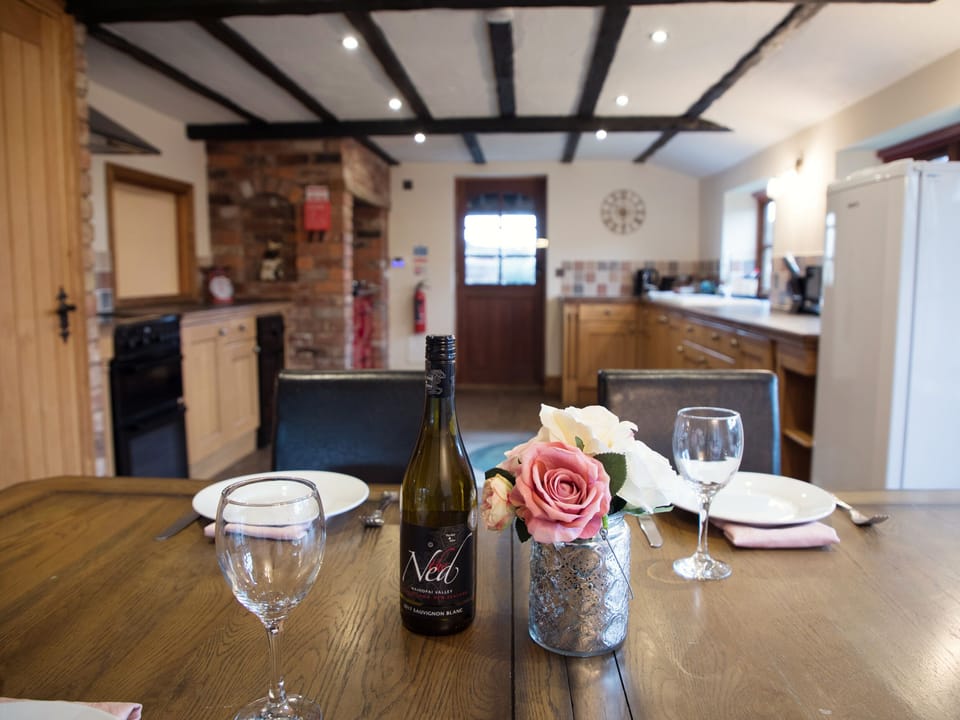 Cottage | Private kitchen | Stovetop, dishwasher, highchair, cookware/dishes/utensils