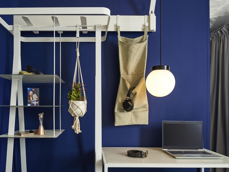 Desk, laptop workspace, blackout drapes, soundproofing