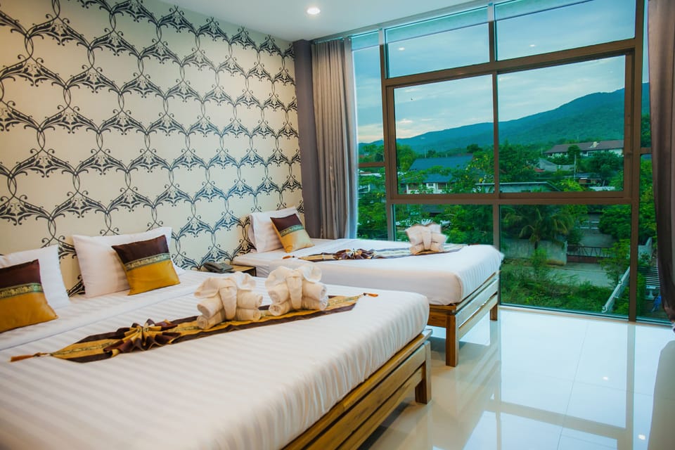 Triple Room | Blackout drapes, free WiFi, bed sheets