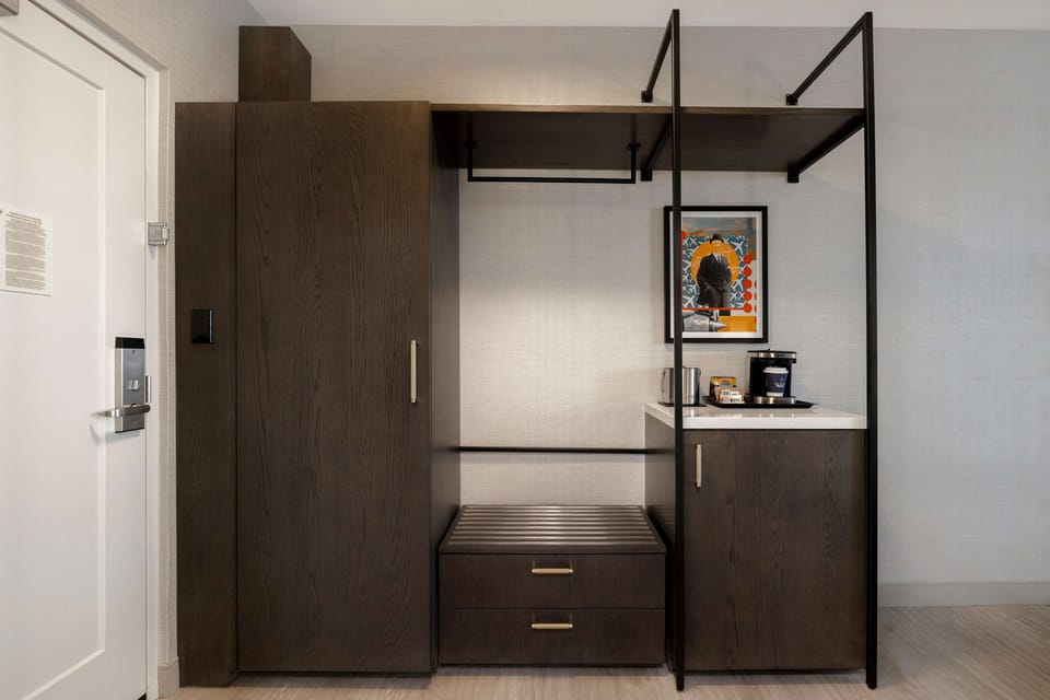 Down comforters, pillowtop beds, in-room safe, desk