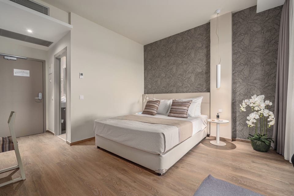 Premium Double Room, Sea Front | Pillowtop beds, in-room safe, desk, blackout drapes