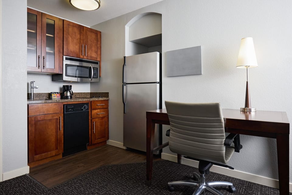 Deluxe Studio Suite, 1 King Bed with Sofa bed, Kitchen | Private kitchen | Microwave, coffee/tea maker, cleaning supplies, freezer