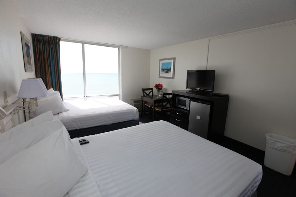 Economy Single Room, 2 Queen Beds, Beach View, Oceanfront | Desk, blackout drapes, free WiFi, bed sheets