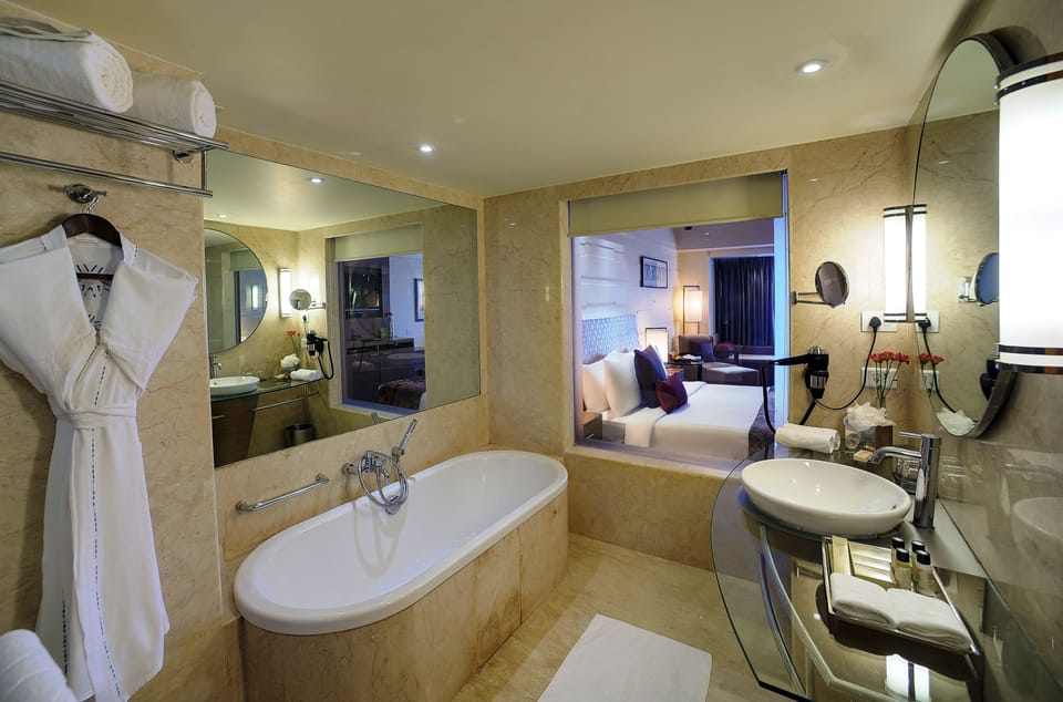 Separate tub and shower, rainfall showerhead, free toiletries