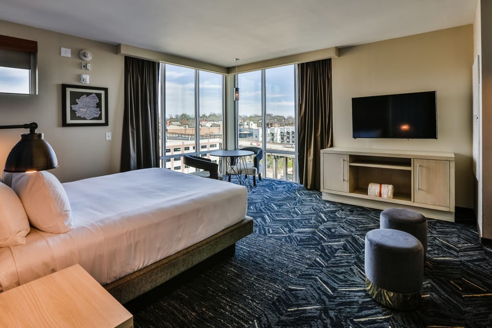 Desk, laptop workspace, blackout drapes, soundproofing