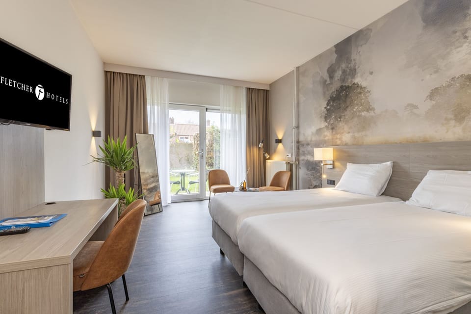 Comfort double room with terrace | Desk, iron/ironing board, cribs/infant beds, free WiFi