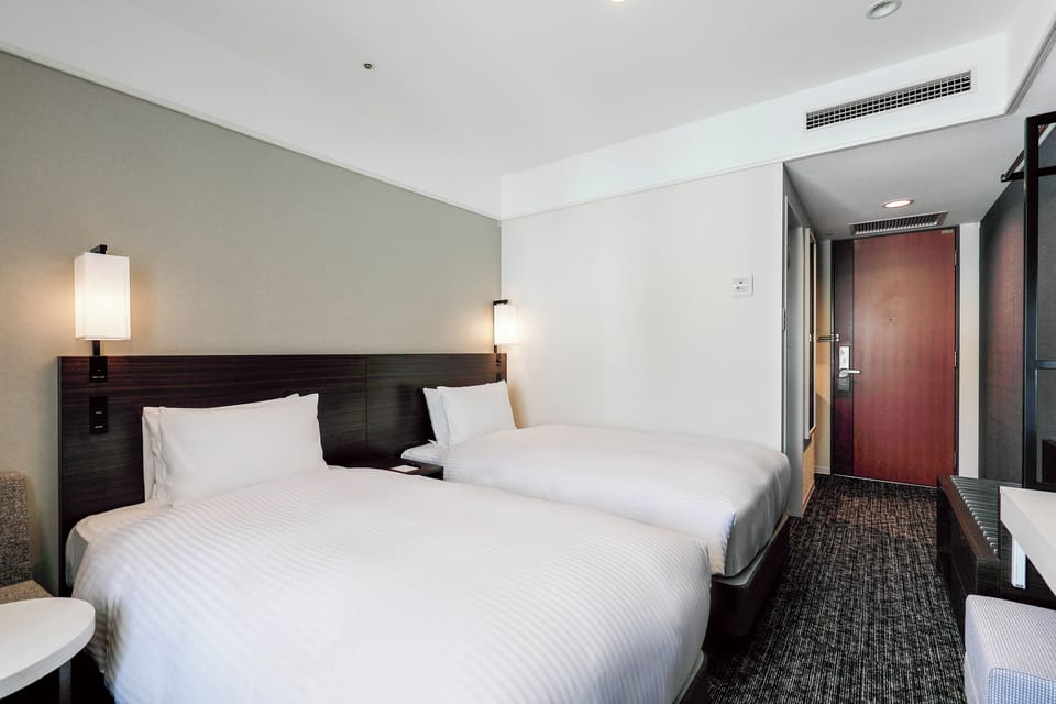 Premium bedding, down comforters, pillowtop beds, desk