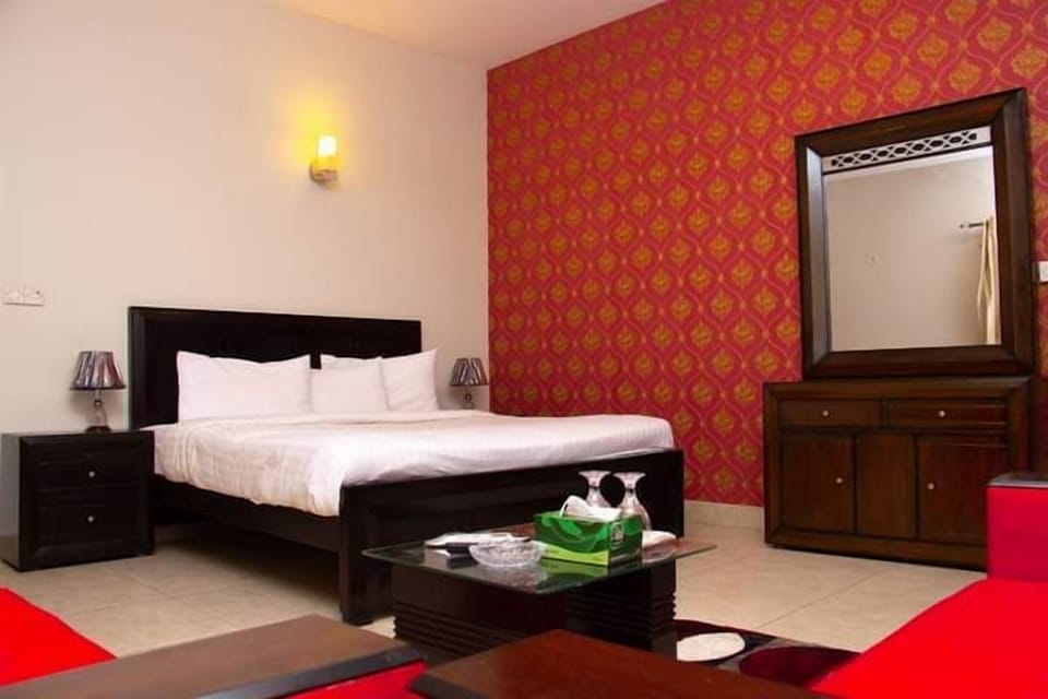 Deluxe Room, 1 King Bed, City View | Minibar, desk, laptop workspace, iron/ironing board