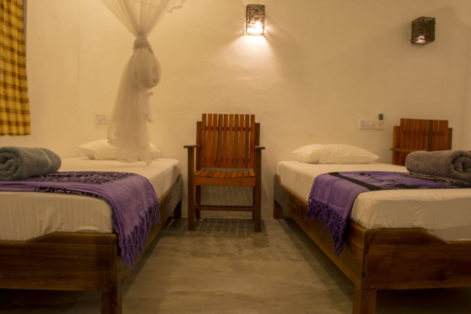 Family Room, Multiple Beds, Balcony, Garden View | In-room safe, desk, blackout drapes, soundproofing