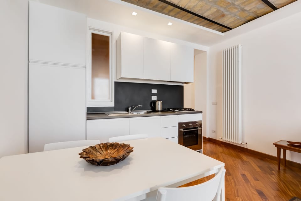 Apartment, 1 Queen Bed with Sofa bed, Non Smoking, City View | In-room dining