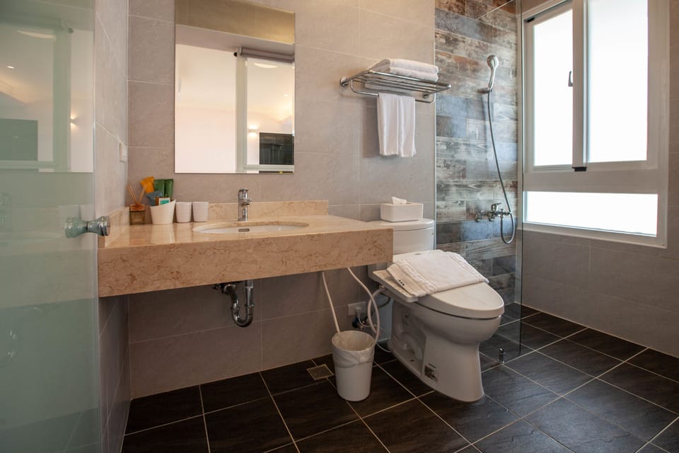 Standard Double Room, 1 Queen Bed | Bathroom | Shower, hair dryer, slippers, towels