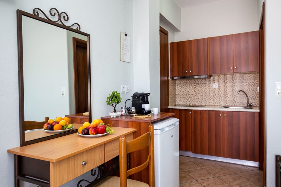 Fridge, stovetop, electric kettle, cookware/dishes/utensils
