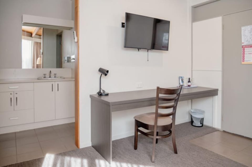 Superior One Bedroom Queen Apartment | Living area | 32-inch TV with cable channels