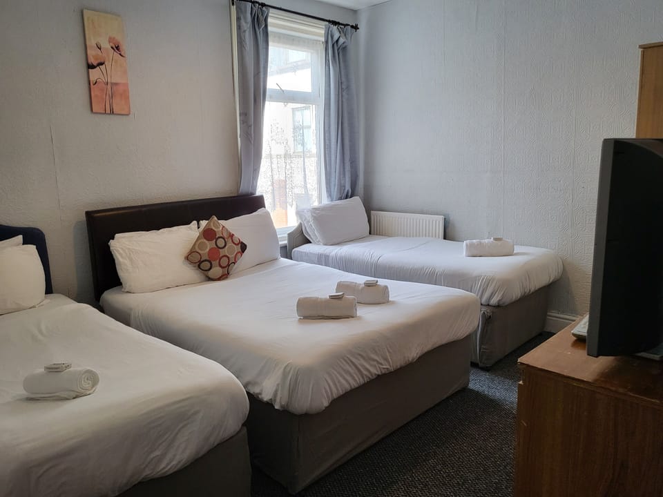 Standard Quadruple Room | In-room safe, soundproofing, iron/ironing board, free cribs/infant beds