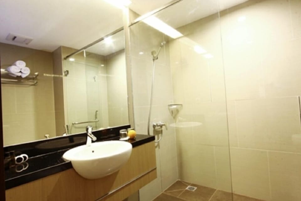 Shower, free toiletries, slippers