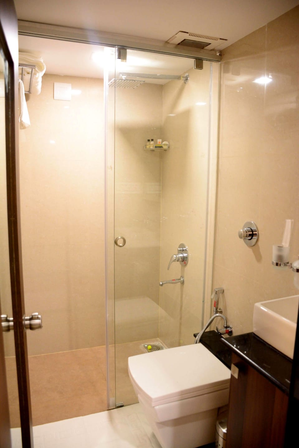 Shower, free toiletries, slippers, towels
