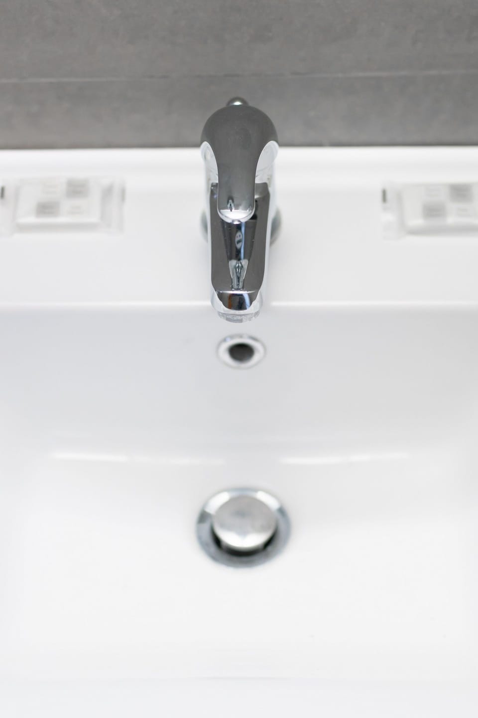 Shower, rainfall showerhead, hair dryer, towels