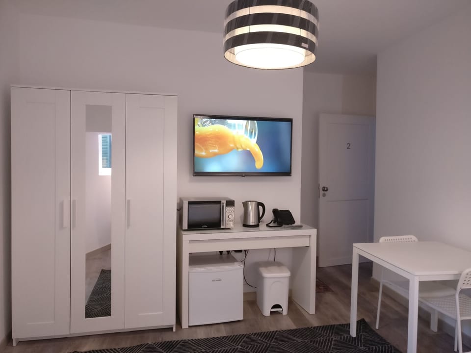 Deluxe Double Room, Refrigerator & Microwave (2) | Minibar, individually decorated, desk, blackout drapes