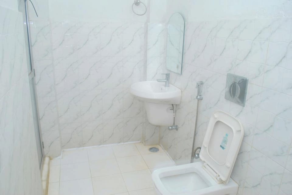 Shower, free toiletries, slippers, towels