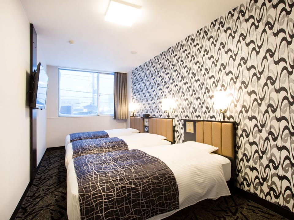 Triple Room, Non Smoking | Desk, blackout drapes, free WiFi