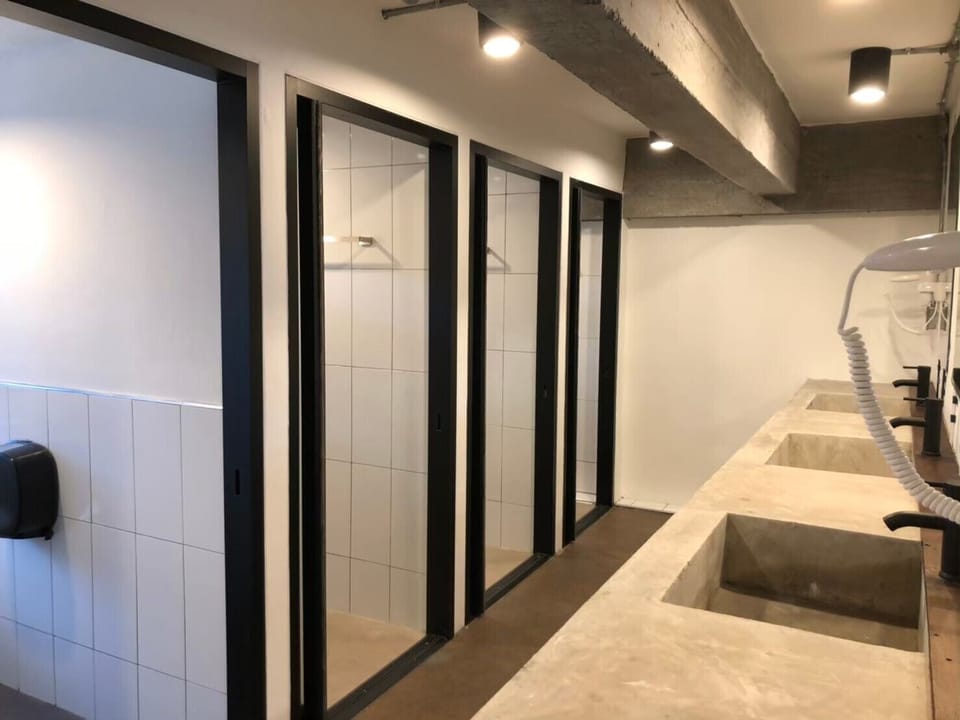Deluxe 3 Bed Female Dorm | Bathroom | Shower, rainfall showerhead, free toiletries, hair dryer