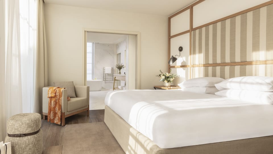 Hypo-allergenic bedding, minibar, in-room safe, laptop workspace
