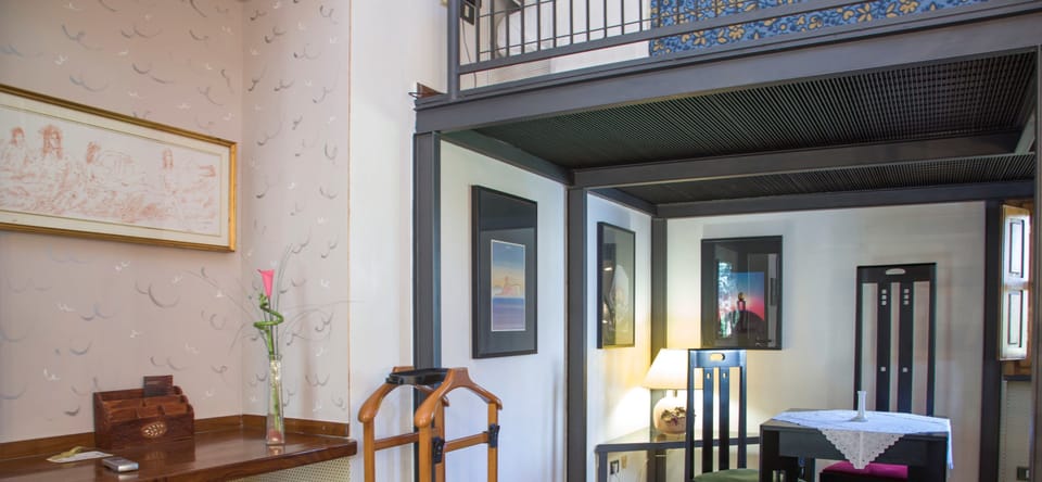 Business Duplex | Living area | Flat-screen TV