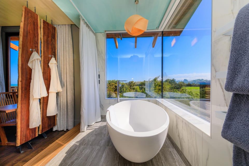 Olive House | Bathroom | Hair dryer, bathrobes, slippers, towels
