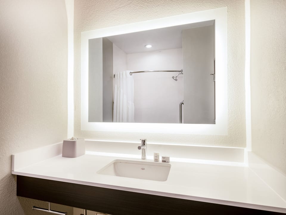 Bathtub, hair dryer, towels