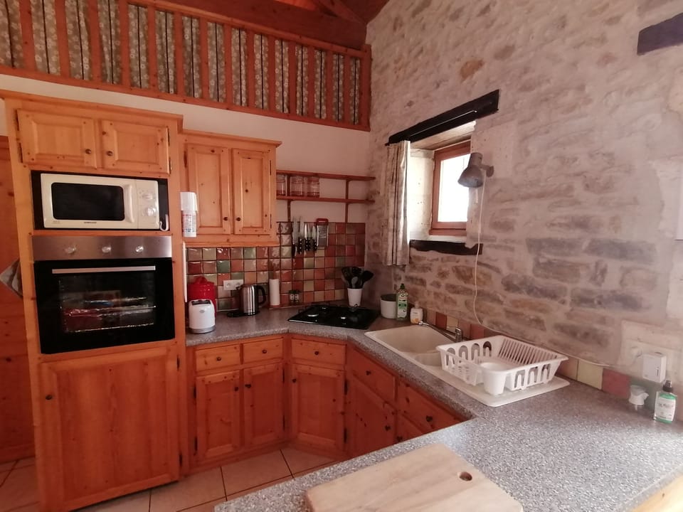 Traditional Cottage, 2 Bedrooms, Pool View, Garden Area (Le Poirier) | Private kitchen | Full-size fridge, microwave, oven, stovetop