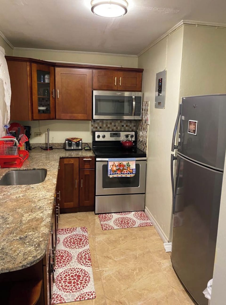 Family Apartment, Multiple Beds, Non Smoking | Private kitchen | Fridge, stovetop, coffee/tea maker, toaster