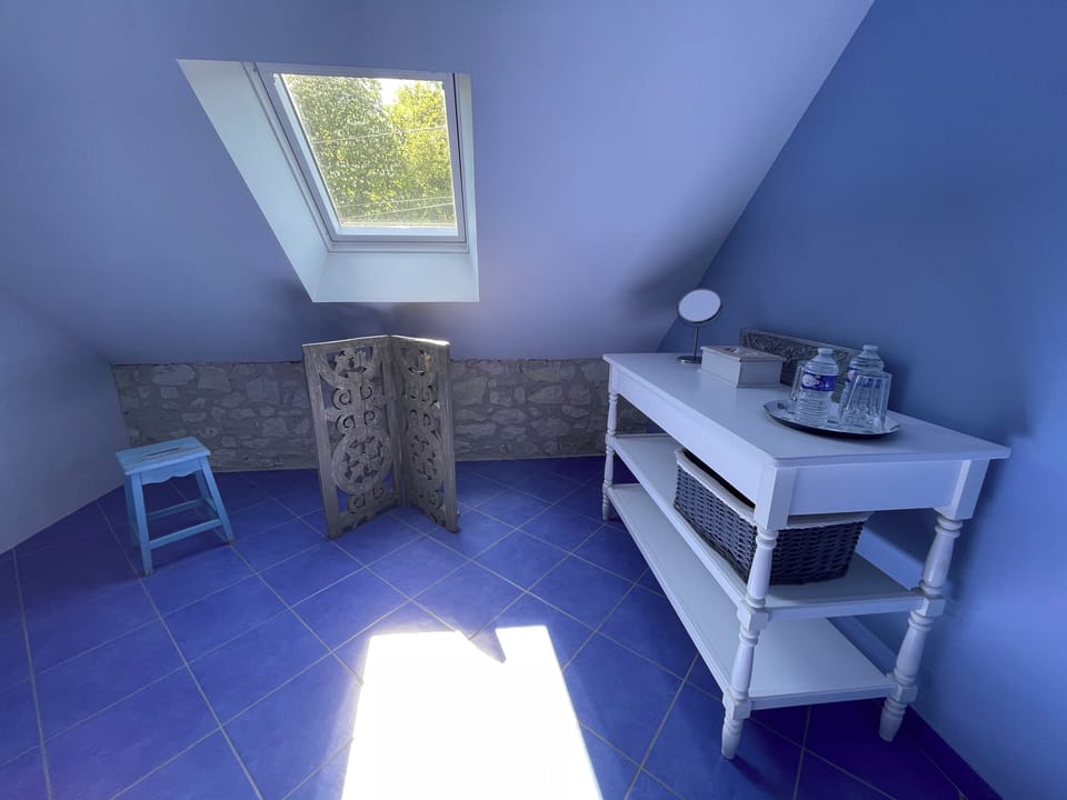 Family Triple Room (Blue) | Bathroom | Hair dryer, towels