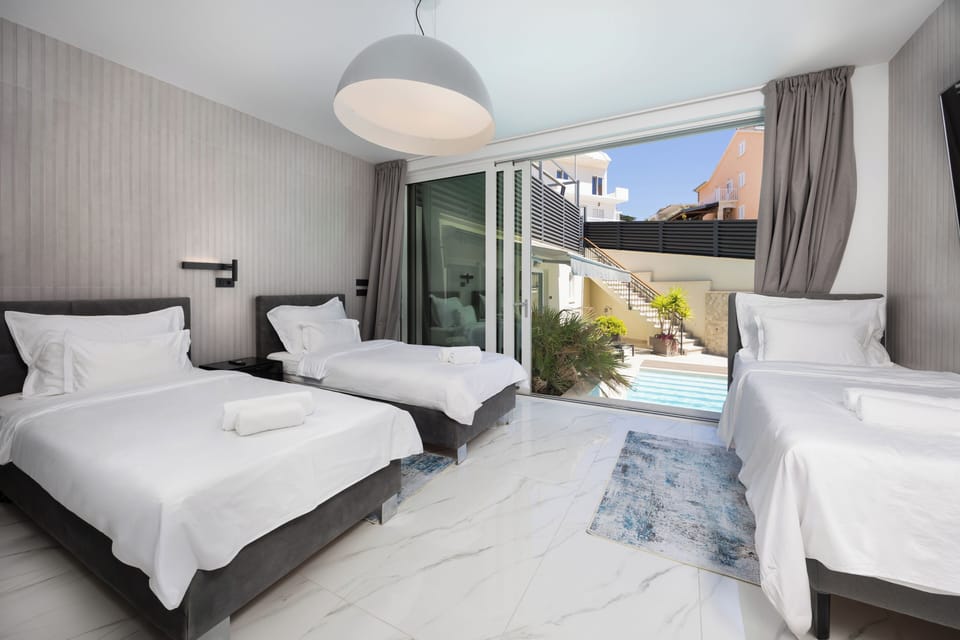 Premium bedding, down comforters, Tempur-Pedic beds, in-room safe