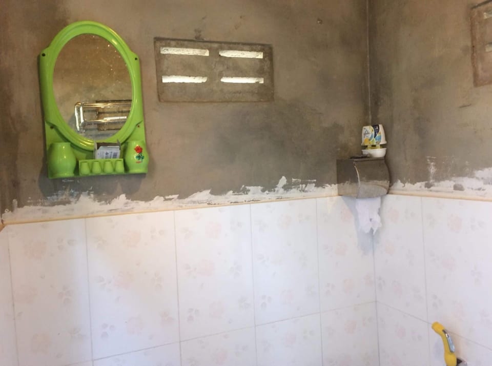 Shower, free toiletries, slippers, towels