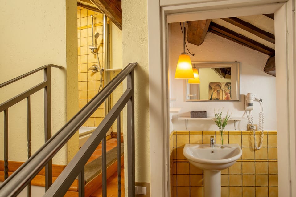 Shower, free toiletries, hair dryer, bathrobes