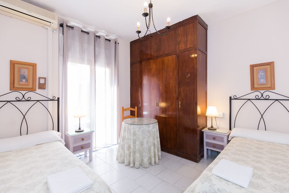 Double or Twin Room, Shared Bathroom | Blackout drapes, iron/ironing board, free WiFi, bed sheets