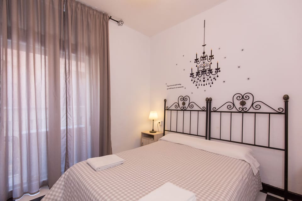 Double or Twin Room, Shared Bathroom | Blackout drapes, iron/ironing board, free WiFi, bed sheets
