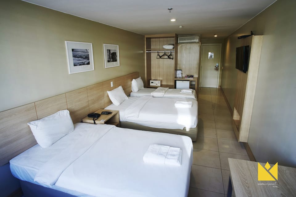 Standard Triple Room, Multiple Beds, Non Smoking | Minibar, in-room safe, desk, blackout drapes
