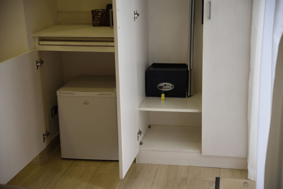 Double Room, Balcony, City View | Mini-refrigerator