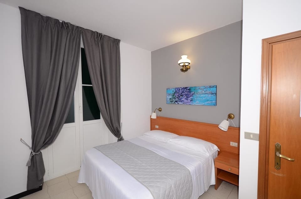 Deluxe Double or Twin Room, Balcony | In-room safe, desk, free WiFi, bed sheets