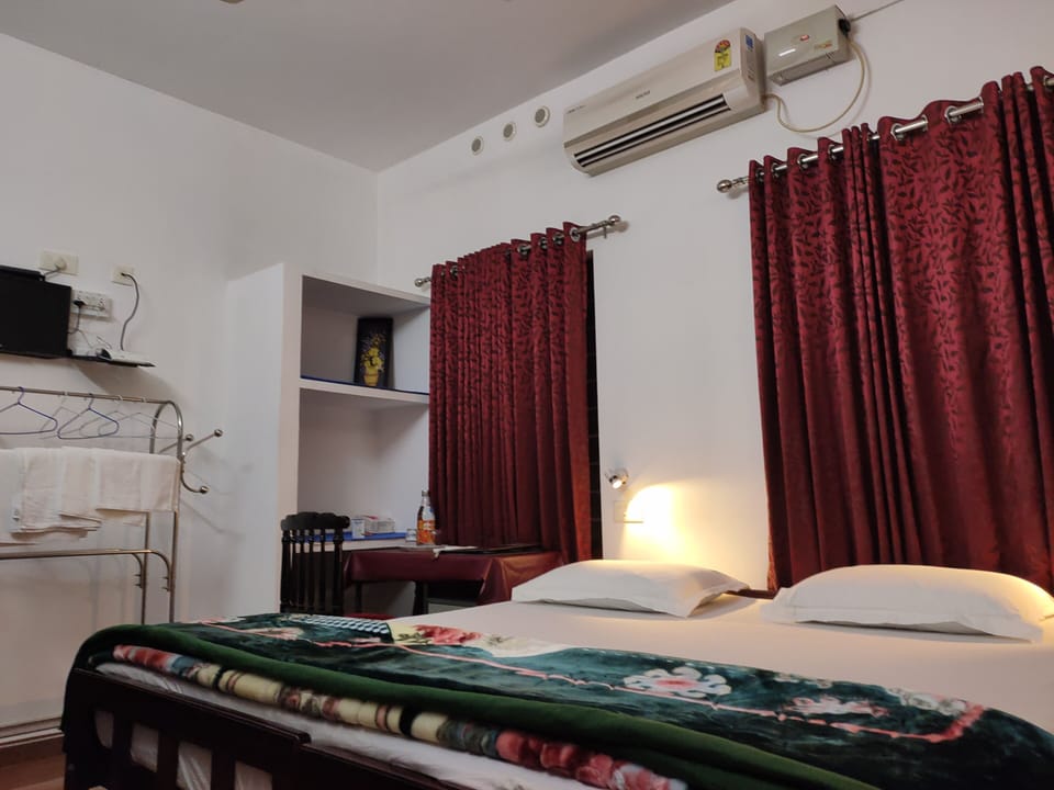 Family Double Room, 1 King Bed, Private Bathroom, River View | Premium bedding, in-room safe, blackout drapes, soundproofing