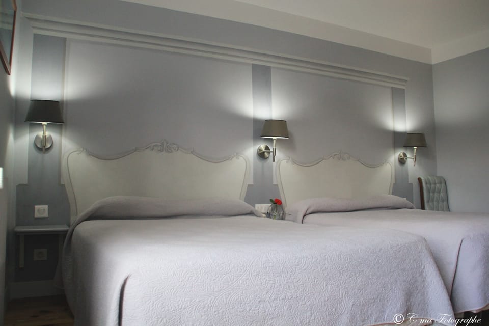 Desk, blackout drapes, soundproofing, rollaway beds
