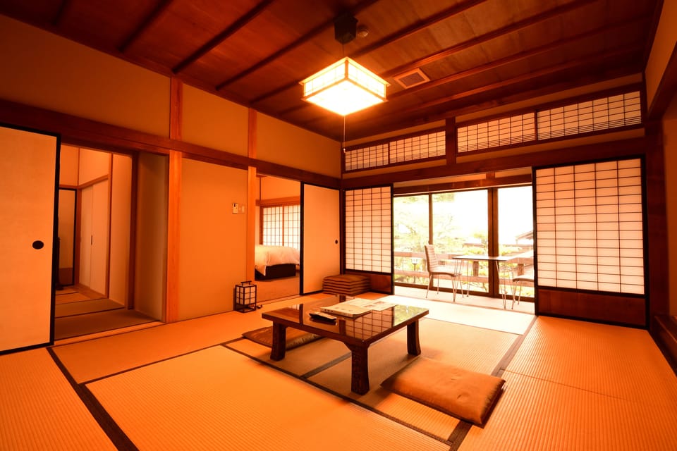 Japanese-Style Deluxe Family Room with Private Shower and Toilet, Non-Smoking | In-room safe, WiFi (free), bed sheets